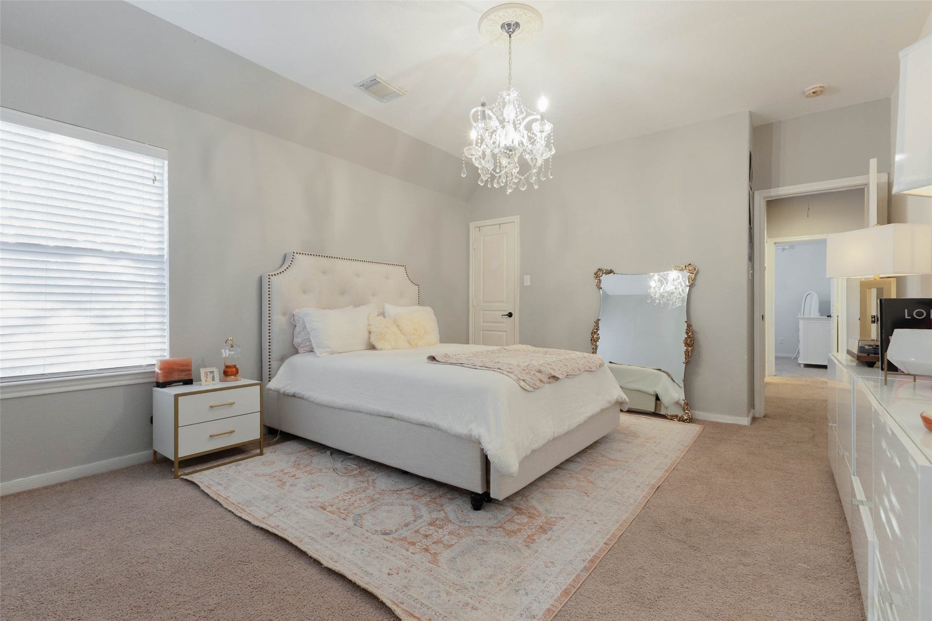 25734 Jewel Springs Lane, Katy, TX 77494 This secondary bedroom boasts a graceful blend of comfort and style.