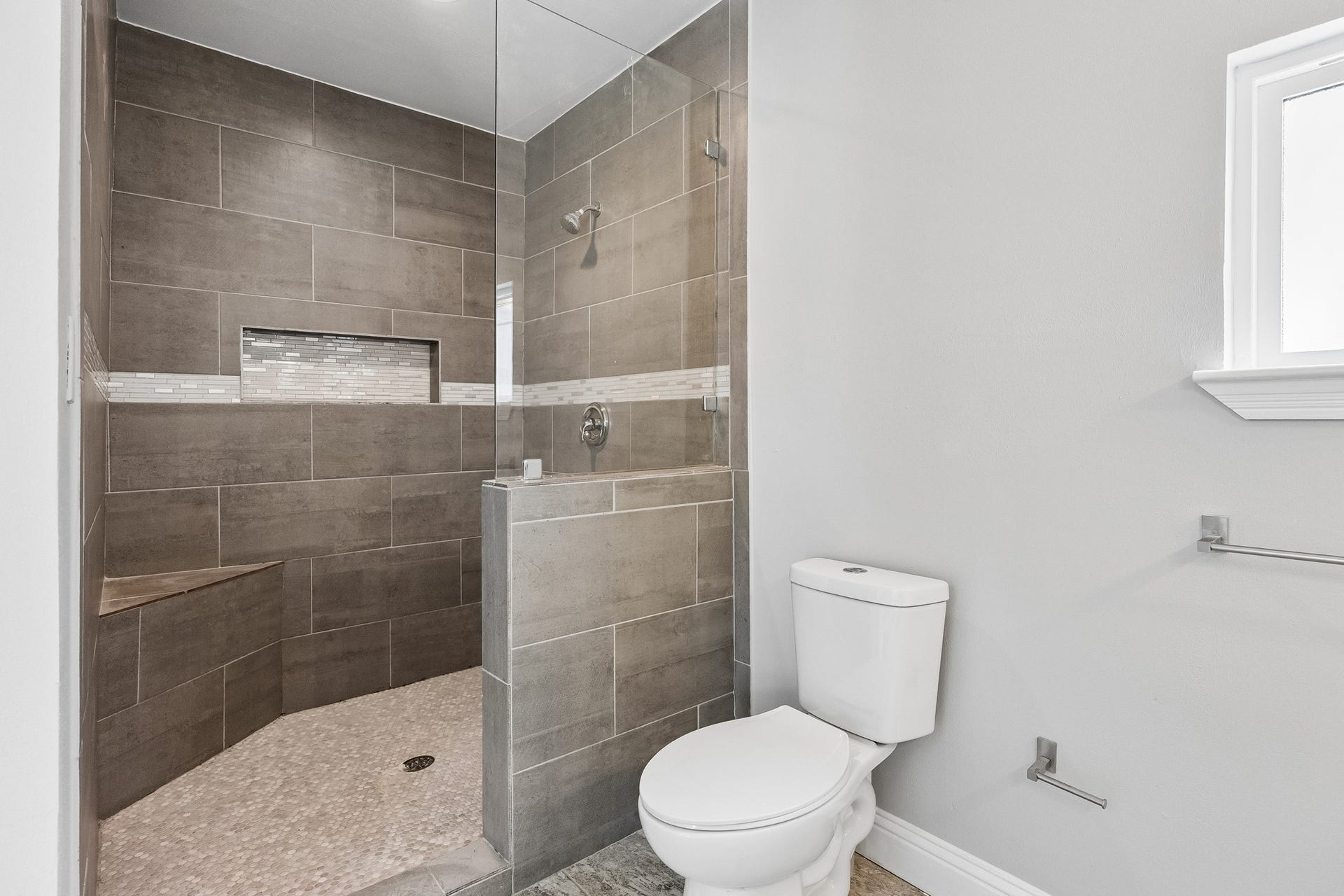 5526 Truett Street, Houston, TX 77023 Primary bathroom has a large, oversized walk-in shower.