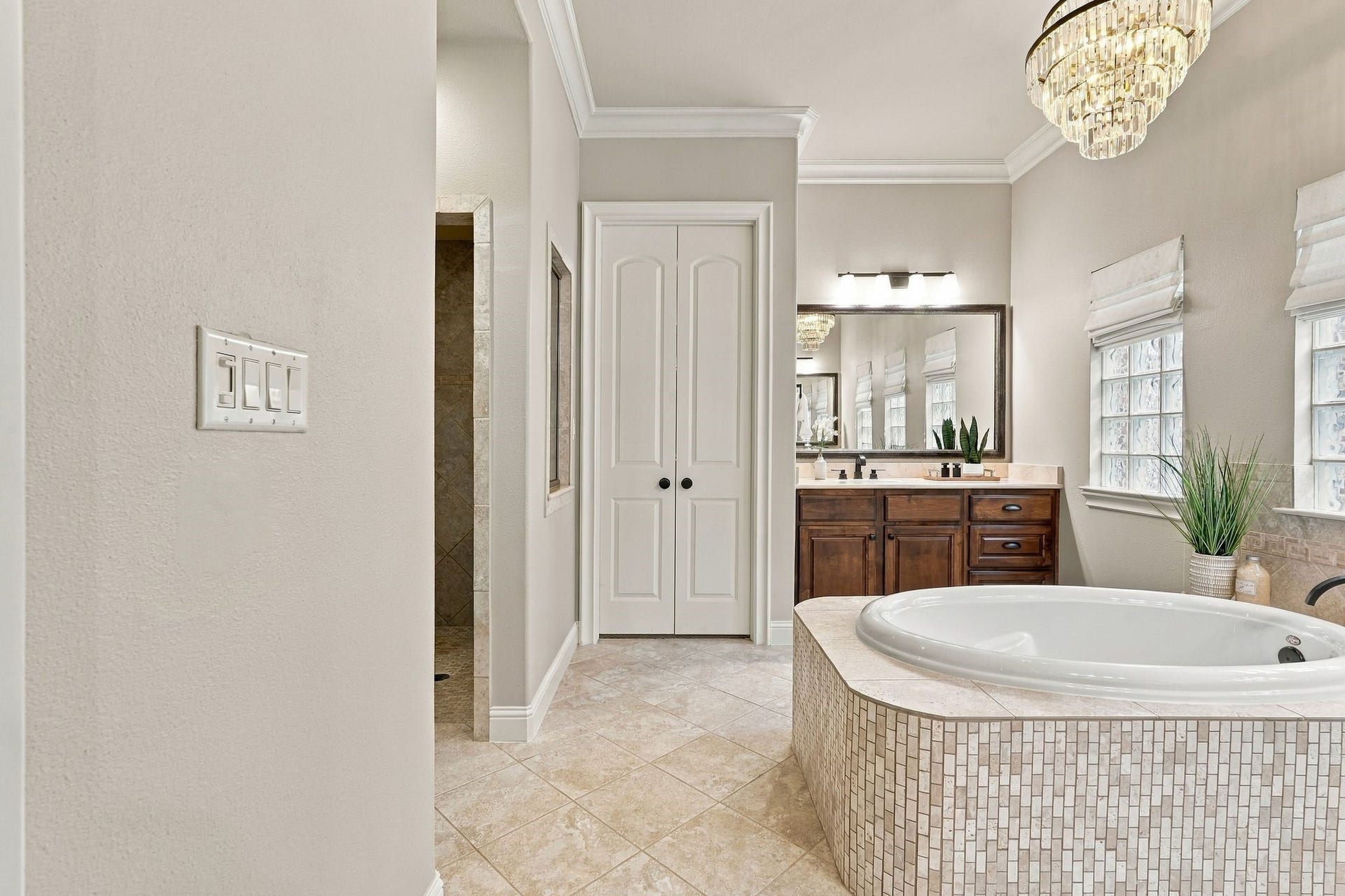 51 Woodglade Way, The Woodlands, TX 77375 Beyond the doors is the huge walk in closet. To the left is the large shower area.