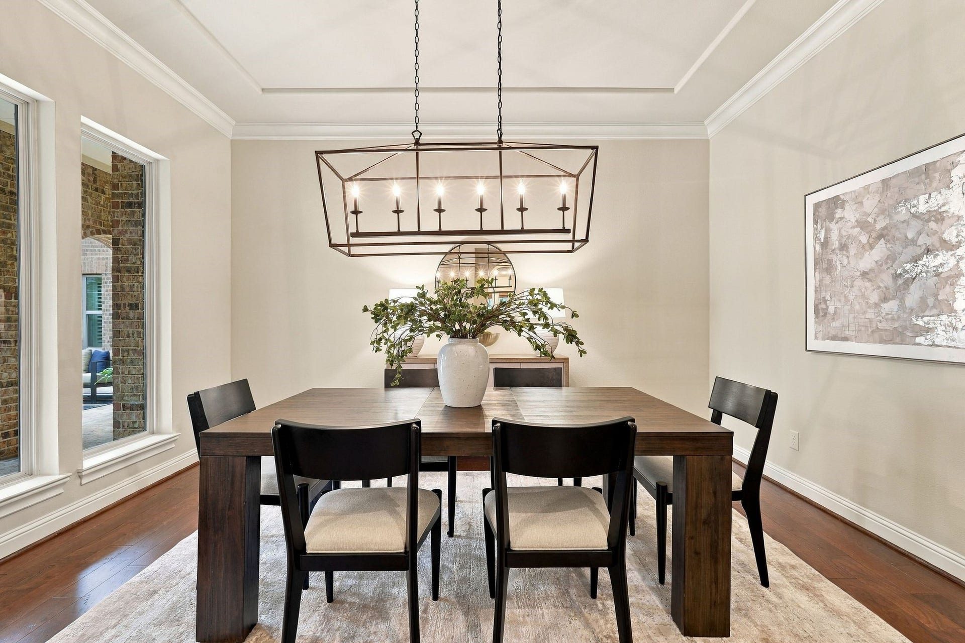 51 Woodglade Way, The Woodlands, TX 77375 Beautiful dining room with large windows overlooking the courtyard