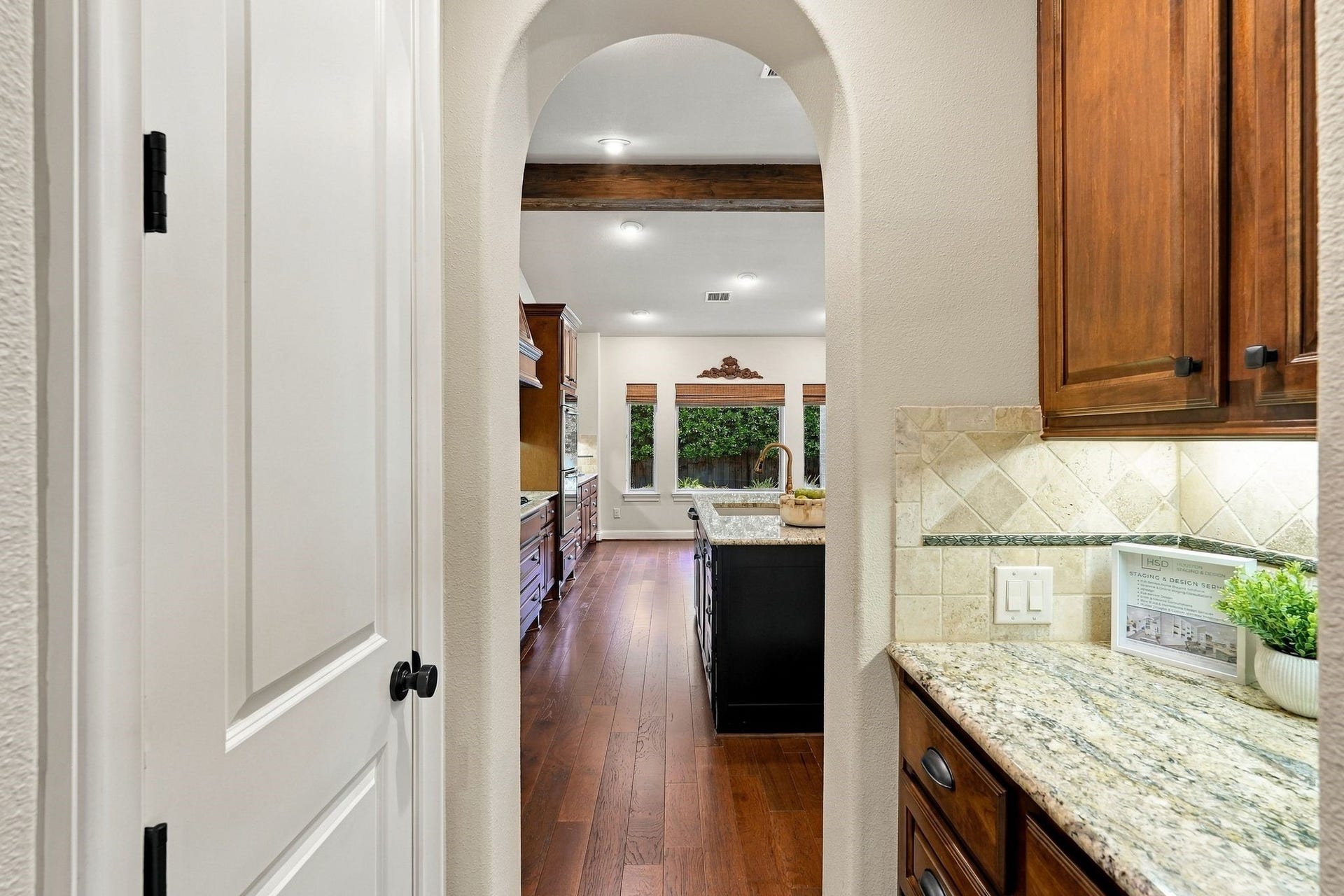 51 Woodglade Way, The Woodlands, TX 77375 Butler's pantry to the right and walk in pantry to the left.