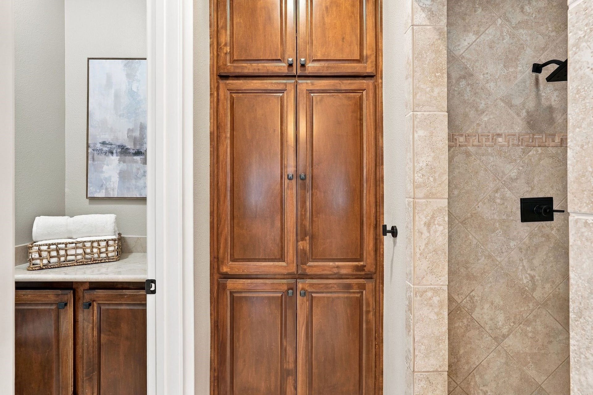 51 Woodglade Way, The Woodlands, TX 77375 Tons of storage in the primary bathroom-to the right is the walk in shower.