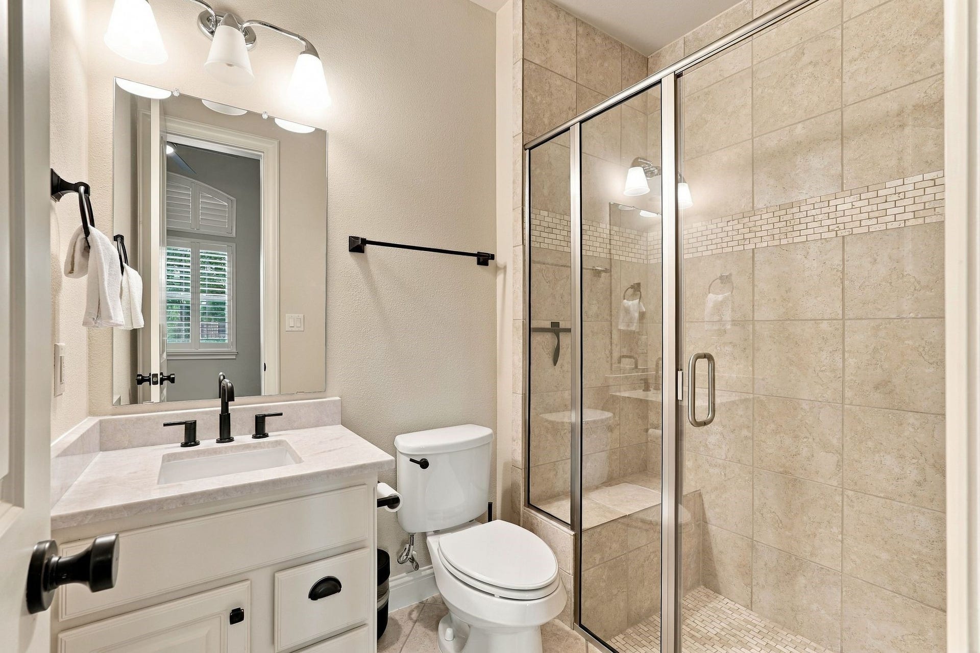 51 Woodglade Way, The Woodlands, TX 77375 Taj Mahal quartzite, large shower.