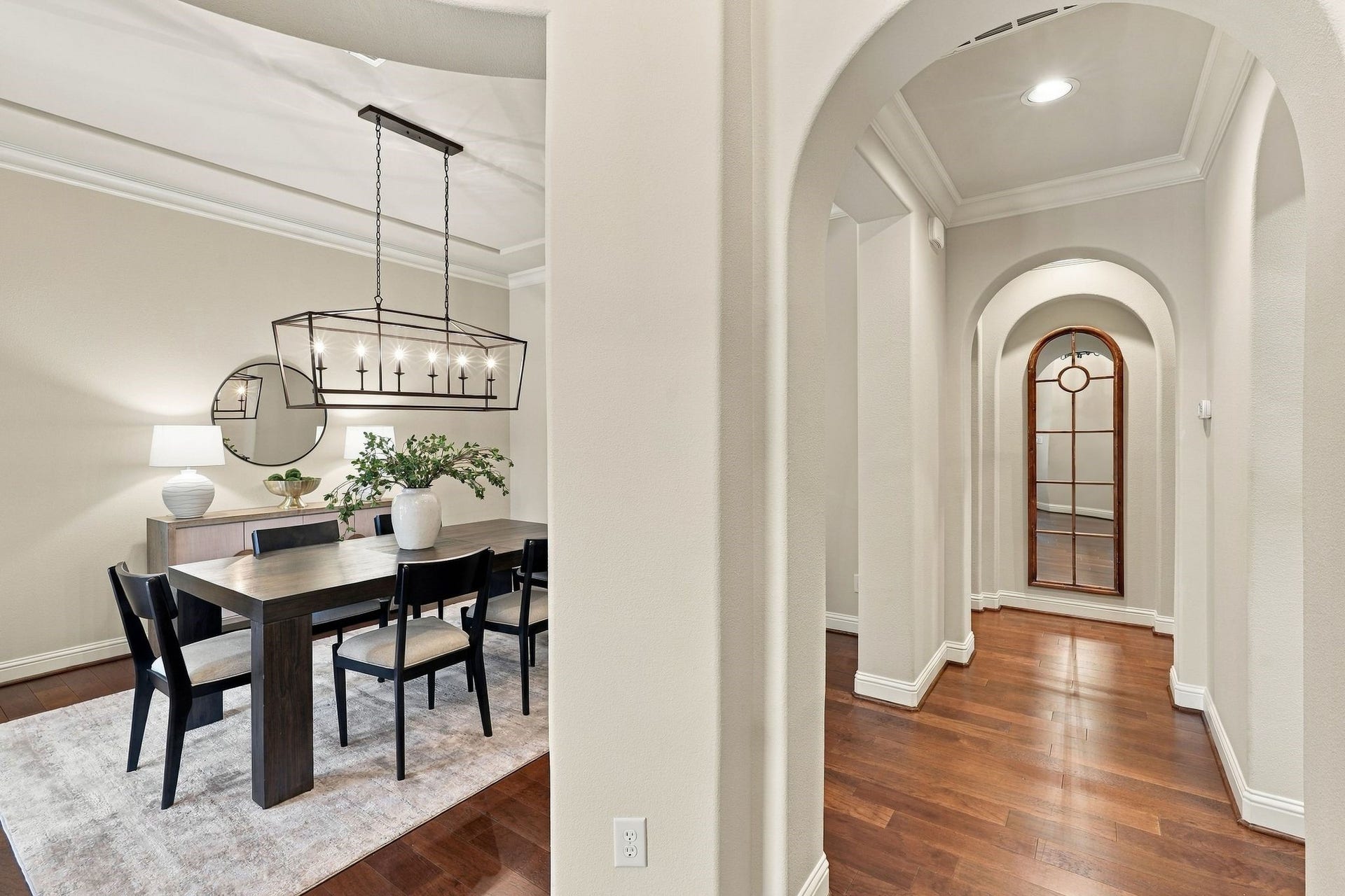 51 Woodglade Way, The Woodlands, TX 77375 To the left of the entrance is the elegant formal dining room.