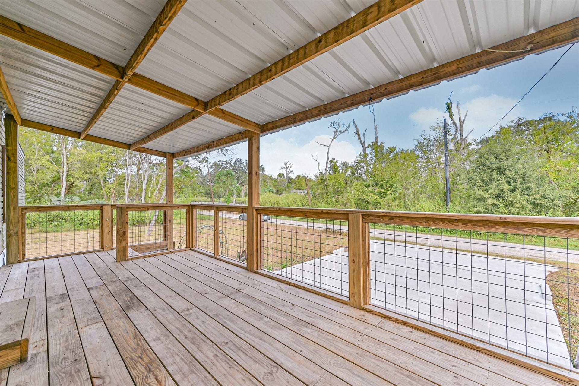 215 Sitka Drive, Holiday Lakes, TX 77515 Enjoy you sunrise or sunset right from your front porch