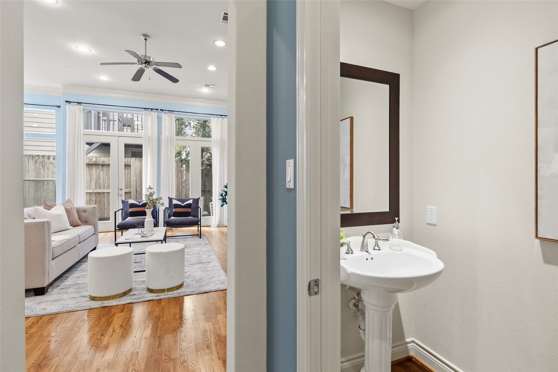 2823 Sherwin Street, Houston, TX 77007 You pass by the powder bathperfectly placed for guestswhile your living room opens up ahead, bright and inviting. Its the kind of layout that keeps everything flowing without ever feeling crowded.