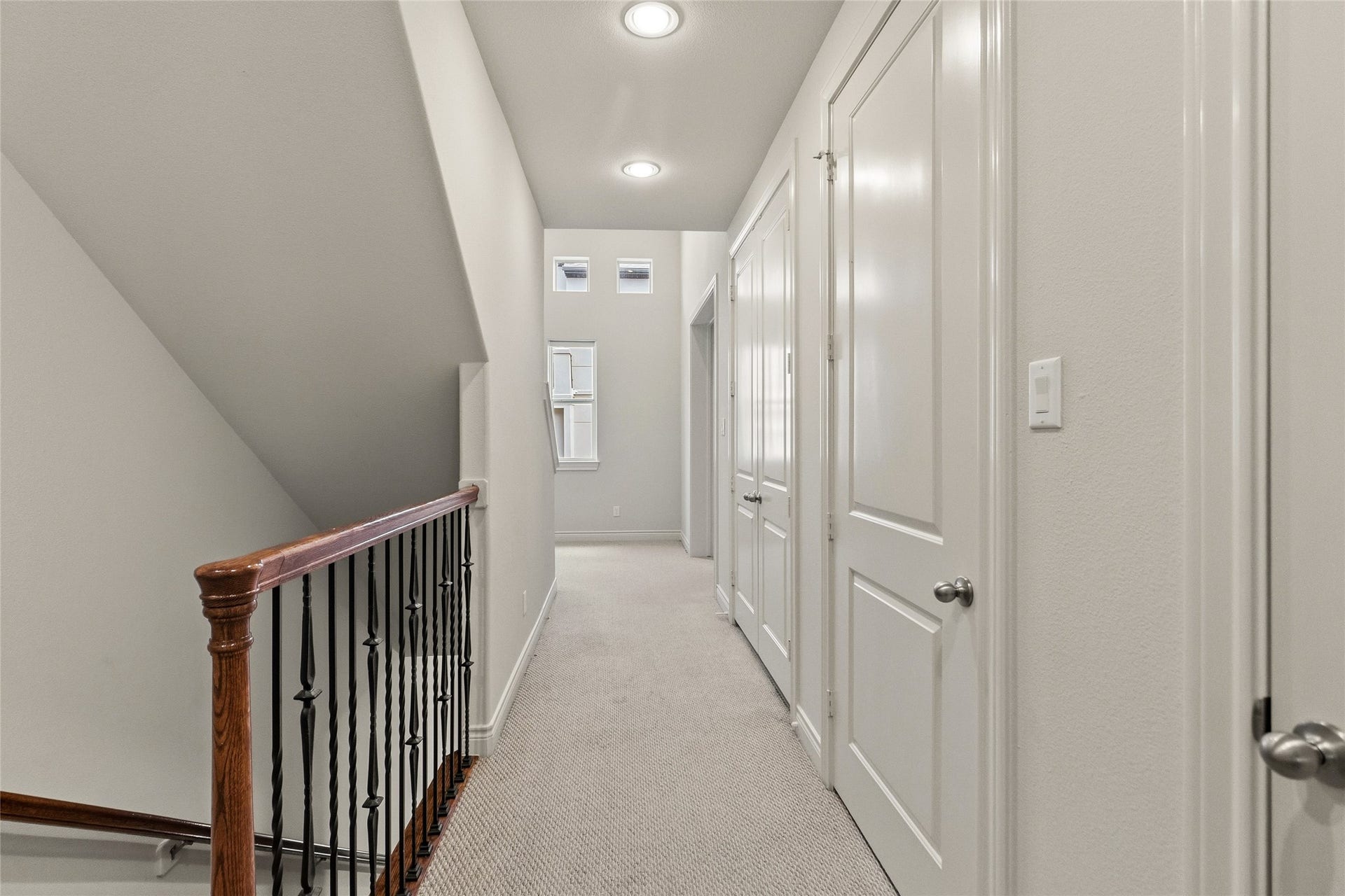 2823 Sherwin Street, Houston, TX 77007 On the second floor, your bright hallway lined with storage, keeping everything tucked away while still within reach. It connects the upper level in a way that feels clean and easy to navigate.