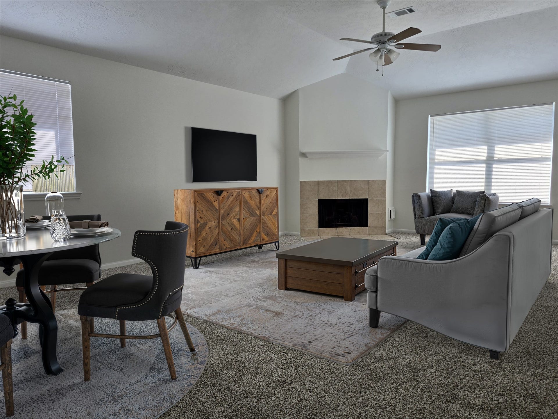 32223 Decker Oaks Drive, Pinehurst, TX 77362 Youre open concept living room and formal dining room are one continuous and very large space. (Virtually staged)