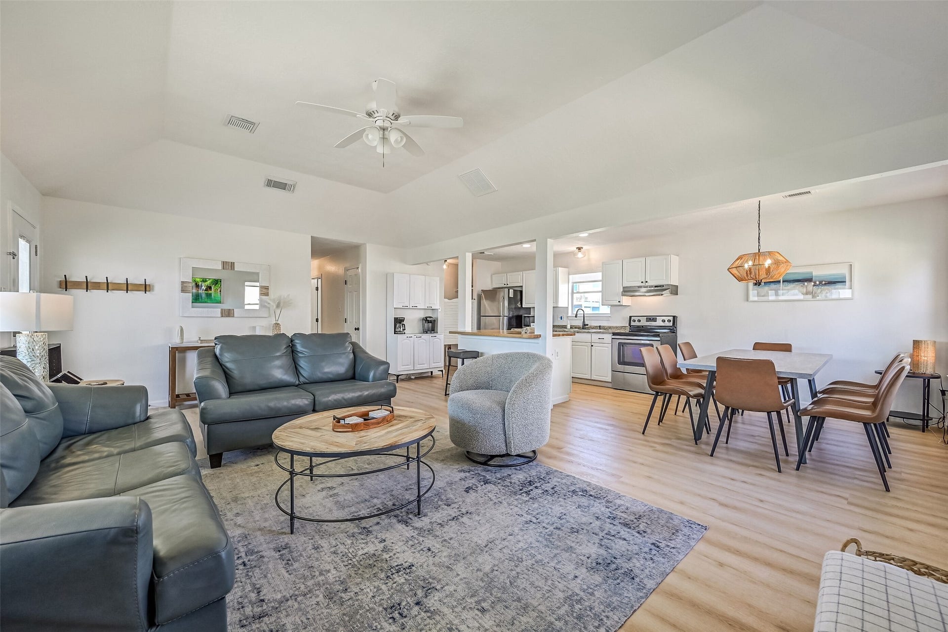 17620 Glei, Galveston, TX 77554 Vinyl plank flooring and soaring ceilings can be found throughout the space, creating a bright, open, and inviting atmosphere.