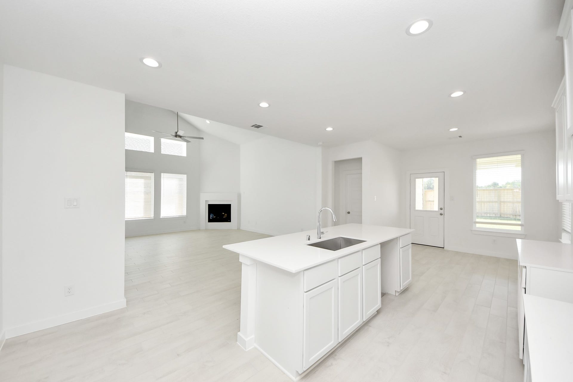 All of this overlooks your expansive family room, creating a perfect space for culinary delights and family gatherings.