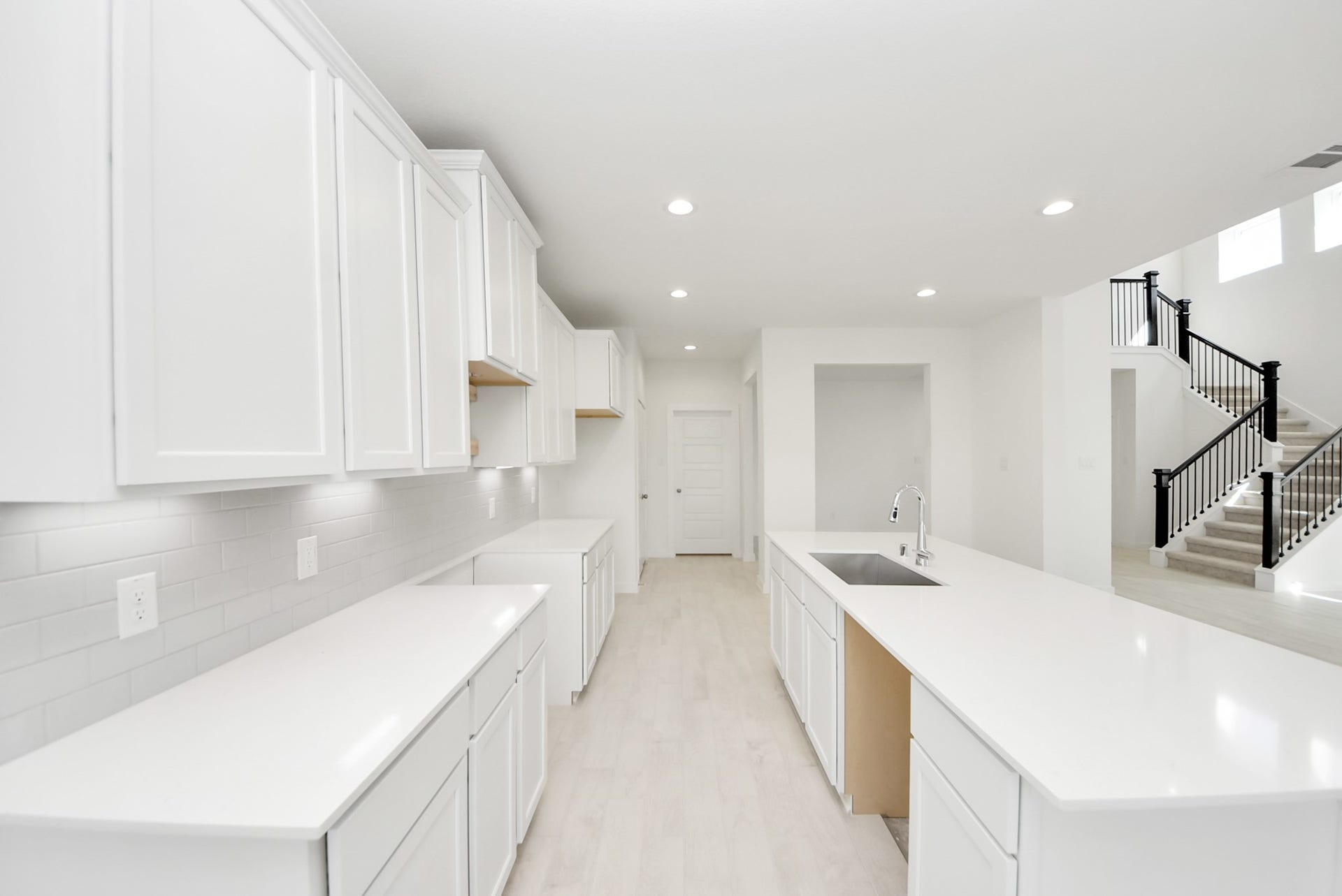 The extended counter area adds both practicality and style, making meal preparation a breeze. Every detail is thoughtfully designed to enhance the kitchen's functionality and aesthetic appeal.