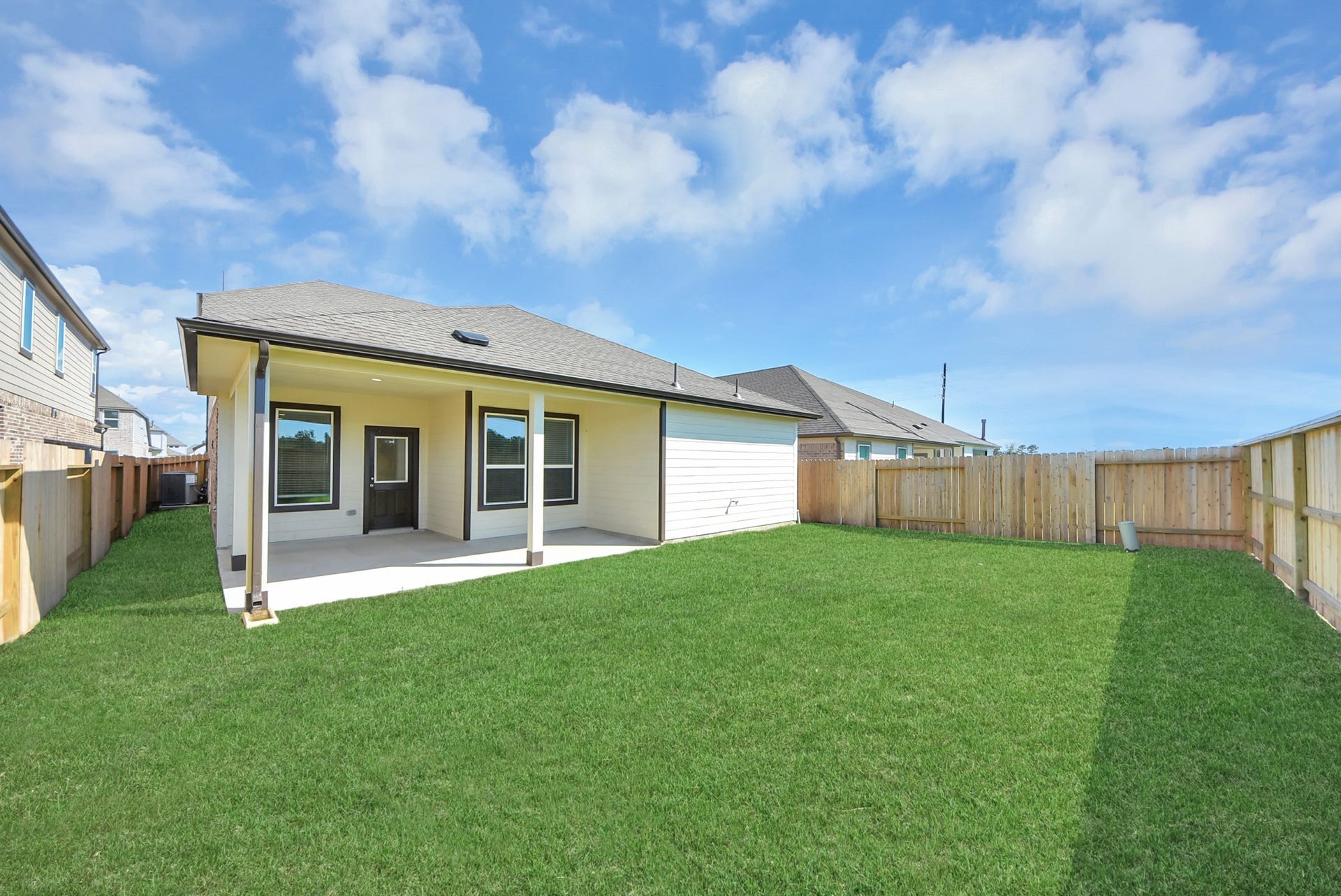 Come and see this spacious backyard with its beautiful covered patio. There is plenty of room for the kids to play and adults to relax. Perfect for your outdoor living space, patio furniture, bbq pit, and so much more. The possibilities are endless!