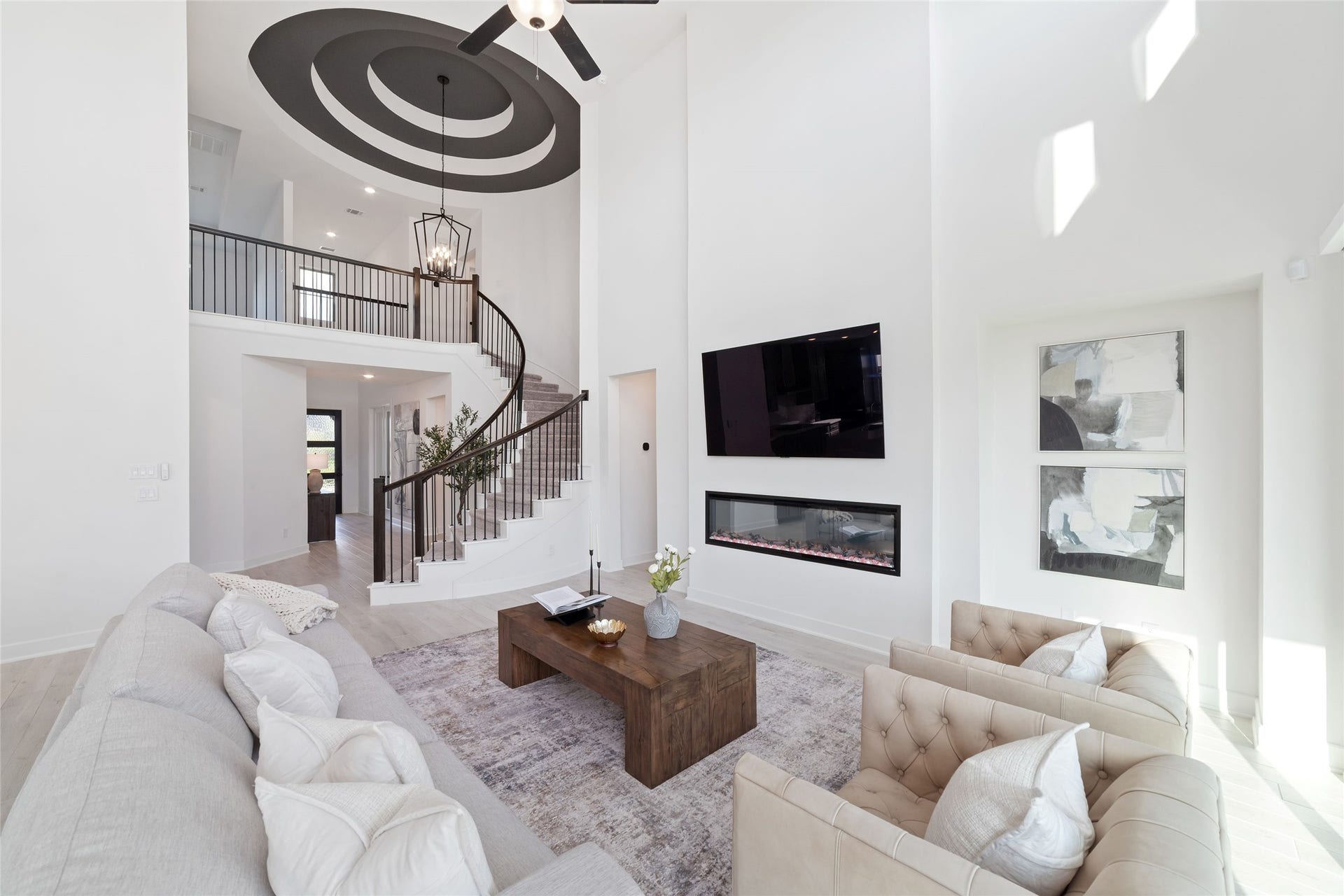 Welcome to 4814 Highland Stream Court, where soaring two-story ceilings, an impressive open-concept living space, and Westin' Homes signature spiral staircase with wrought iron balusters create an unforgettable first impression. Lovingly maintained and only lightly lived-in by its original owner, this home feels new, elegant and move-in ready.
