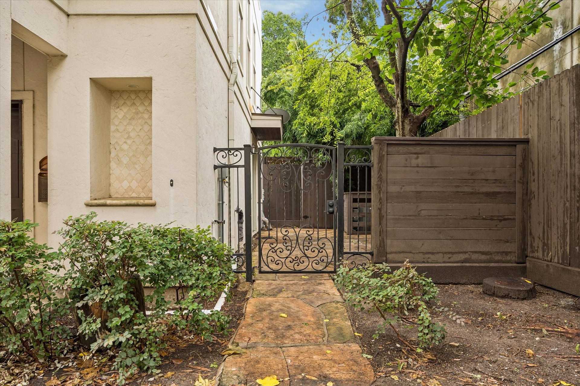 1112 Peveto Street, #C, Houston, TX 77019 The front door is located through a peaceful gated courtyard.