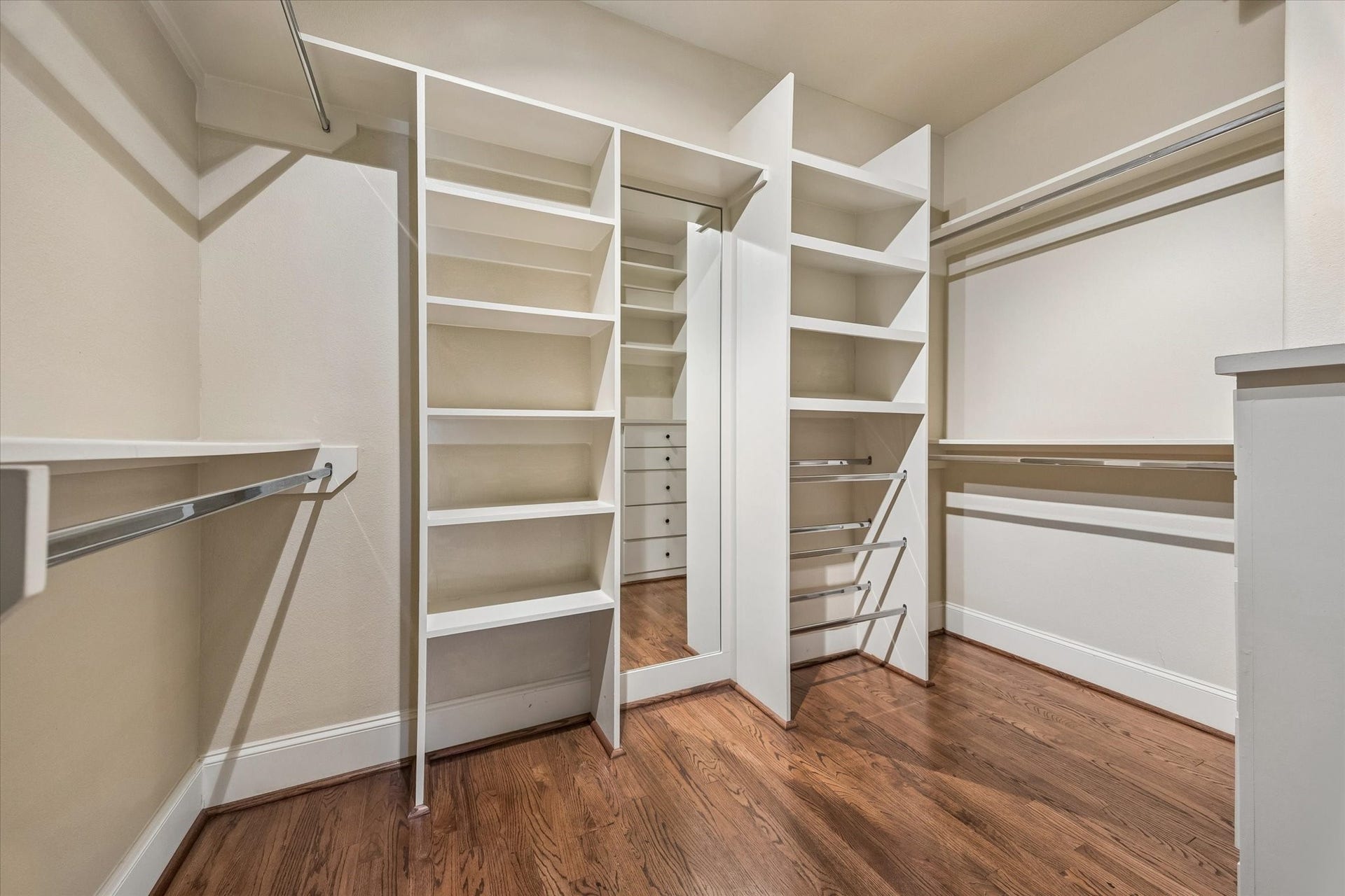 1112 Peveto Street, #C, Houston, TX 77019 The large primary closet has a great amount of storage in addition to a linen closet in the bathroom.