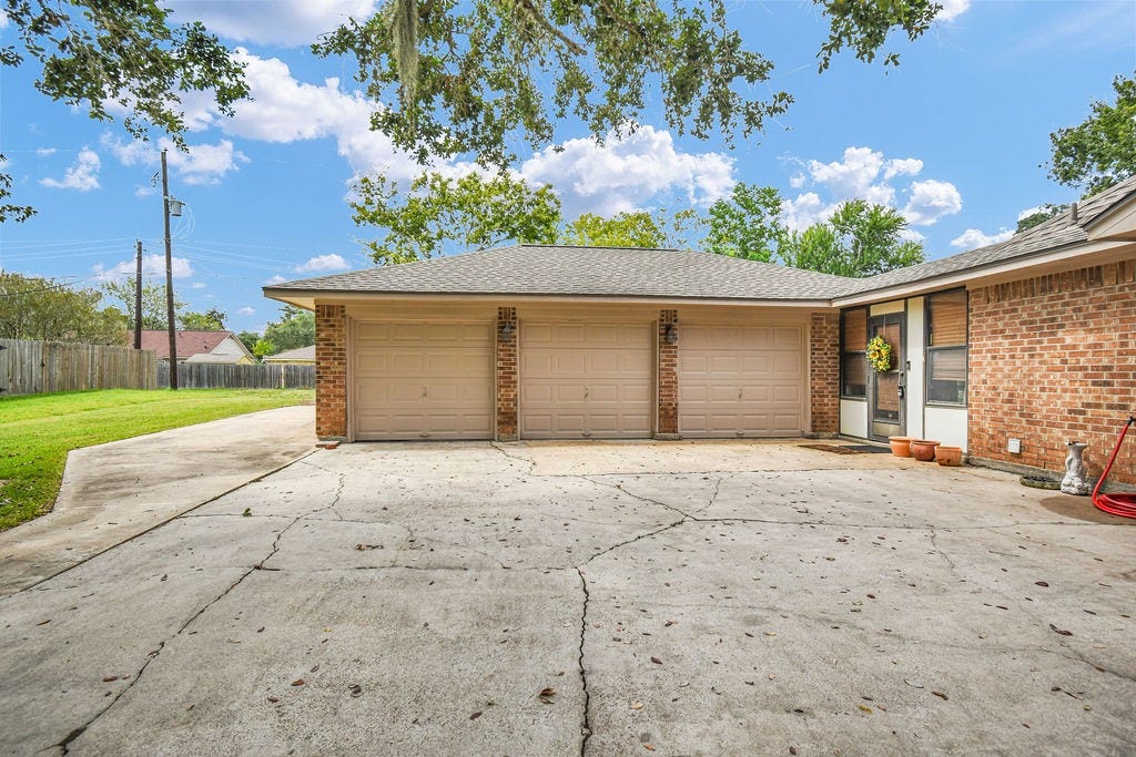 131 Frostwood Drive, Lake Jackson, TX 77566 Additional concrete added beside the 3 car garage