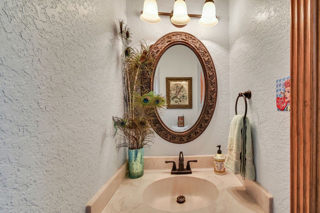 131 Frostwood Drive, Lake Jackson, TX 77566 Half bath located in the laundry room