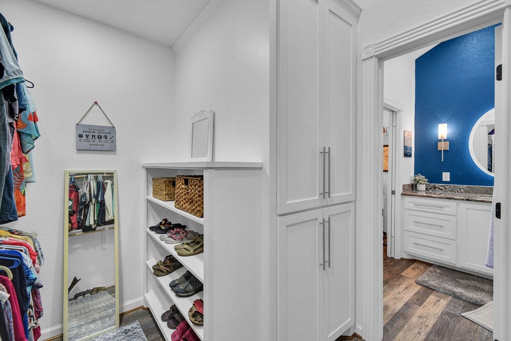 131 Frostwood Drive, Lake Jackson, TX 77566 Updated walk in closet with built in shoe rack