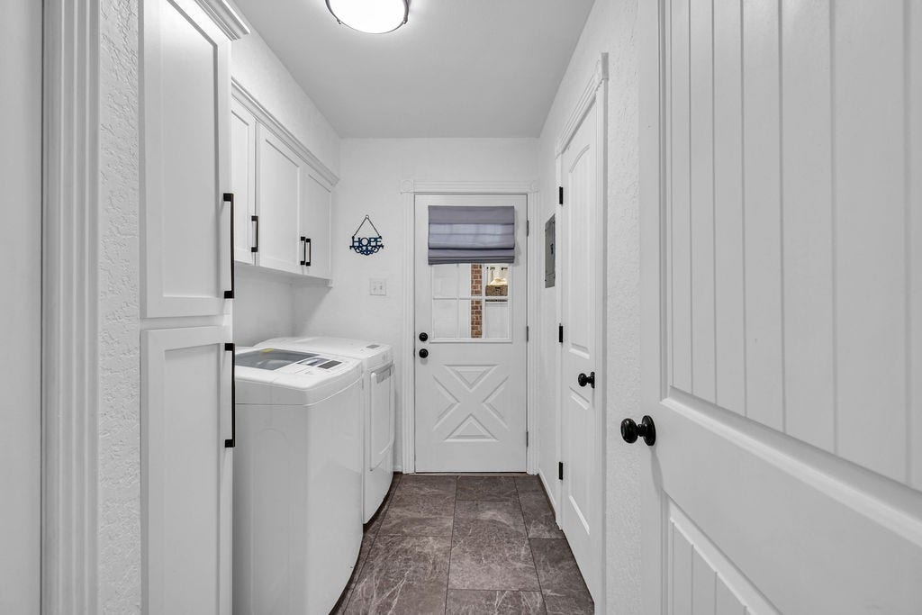 131 Frostwood Drive, Lake Jackson, TX 77566 Updated doors throughout the home. On the left you have custom built-ins. On the right is the half bath