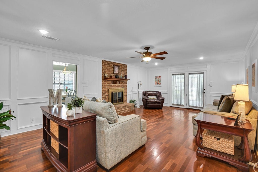 131 Frostwood Drive, Lake Jackson, TX 77566 Beautiful library paneling in the living room