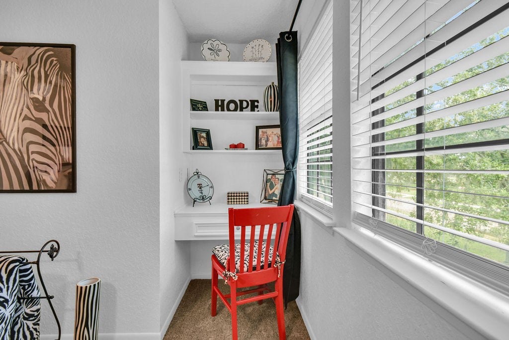 131 Frostwood Drive, Lake Jackson, TX 77566 Cute nook with desk in the "black and red" bedroom