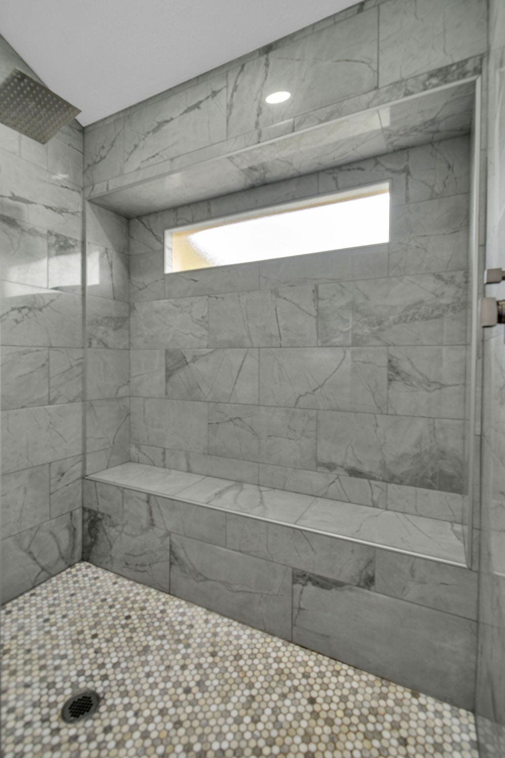 131 Frostwood Drive, Lake Jackson, TX 77566 Walk in shower with built in bench and window for bright light