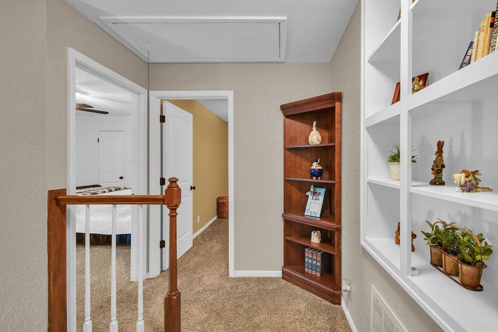 131 Frostwood Drive, Lake Jackson, TX 77566 Head upstairs and be greeted with built in cabinetry
