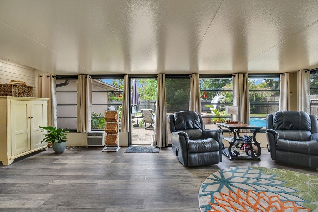 131 Frostwood Drive, Lake Jackson, TX 77566 Large windows to view the beautiful pool
