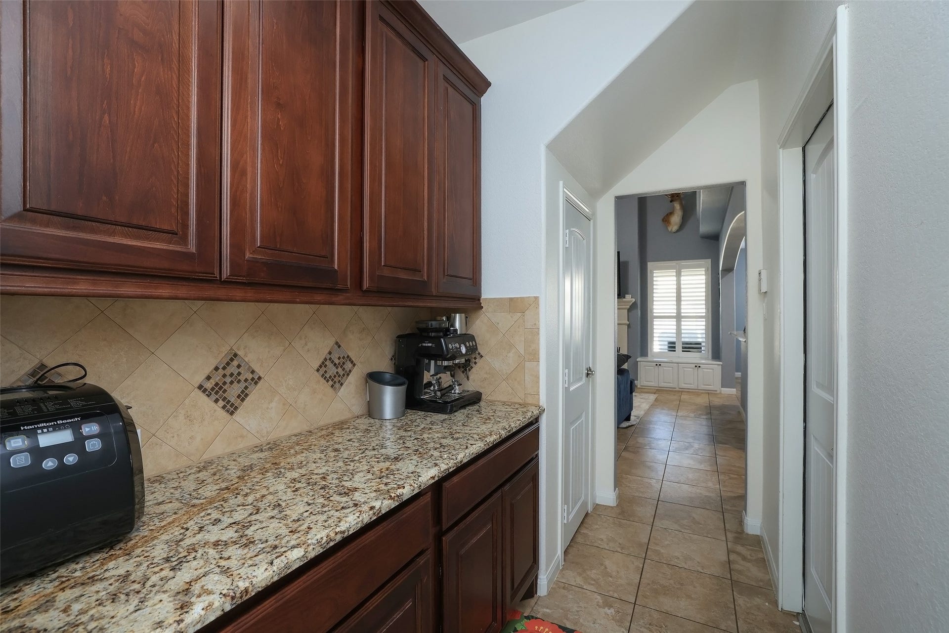 20811 Noble Crusade Court, Tomball, TX 77375 Butlers pantry with storage closet on the left, and garage entry on the right