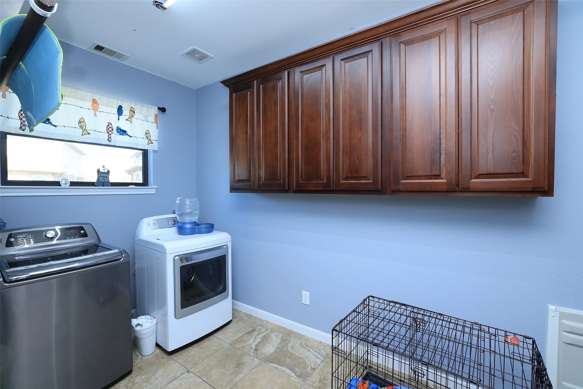 20811 Noble Crusade Court, Tomball, TX 77375 Oversized laundry room with doggy door to fenced side yard