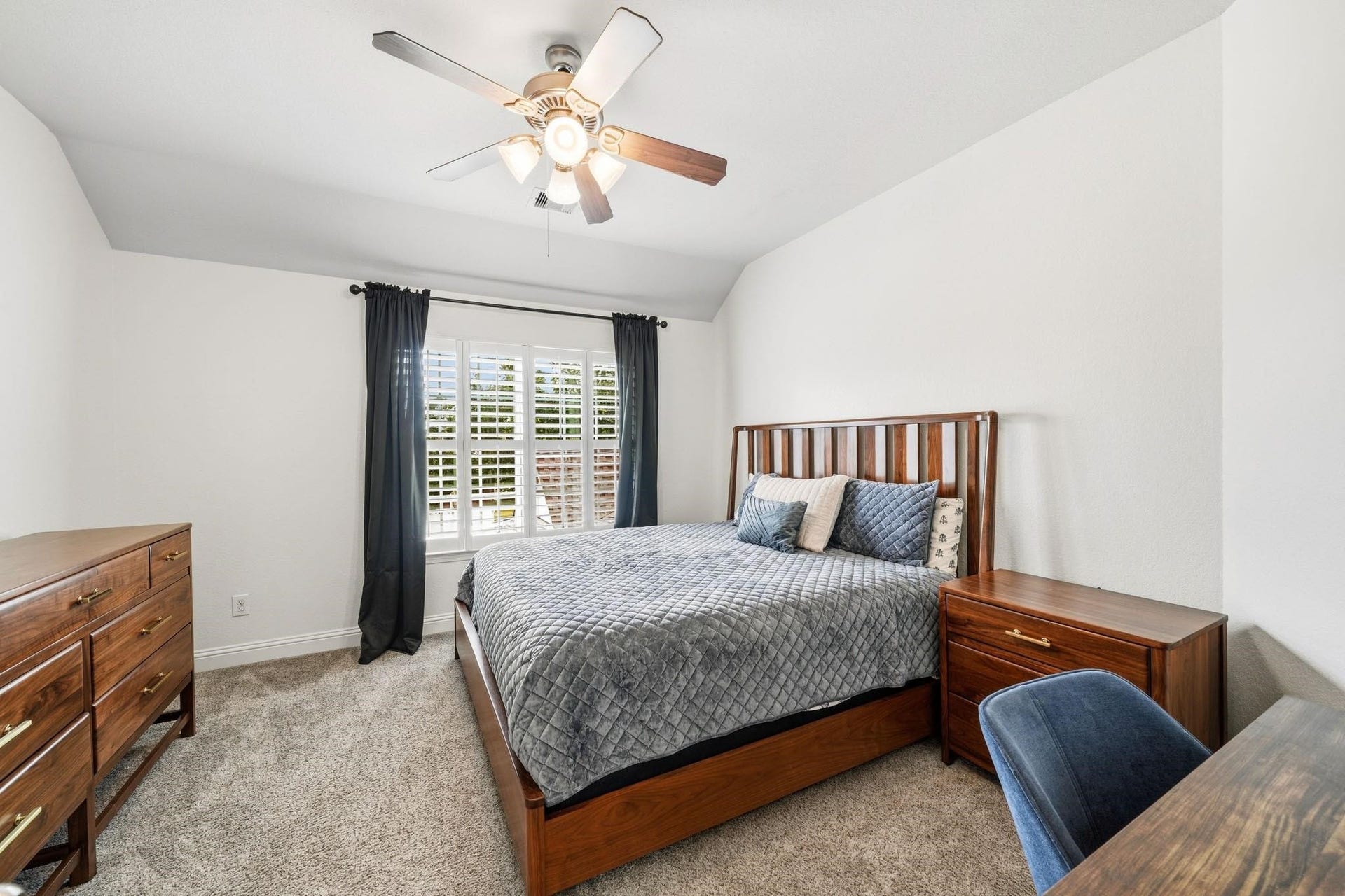 17610 Strackfield Lane, Tomball, TX 77377 Located just off the landing, the third bedroom feels both private and welcoming, with a tray ceiling adding architectural charm and soft carpet enhancing everyday comfort.