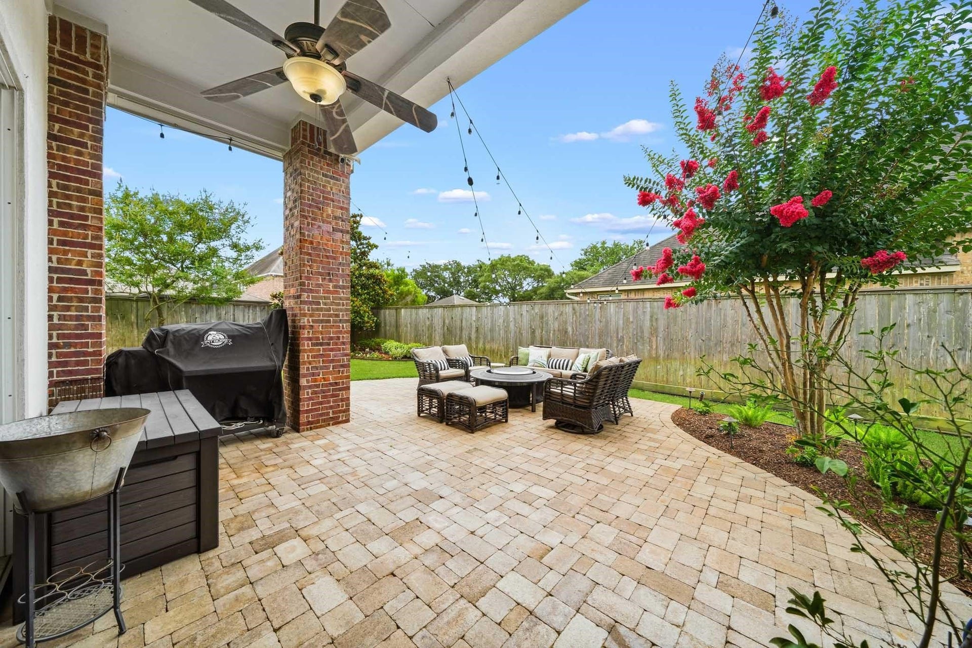 17610 Strackfield Lane, Tomball, TX 77377 The expansive brick paver patio extends well beyond the covered porch, creating an exceptional outdoor living space perfect for entertaining, dining al fresco, or simply enjoying the outdoors. Welcome Home!
