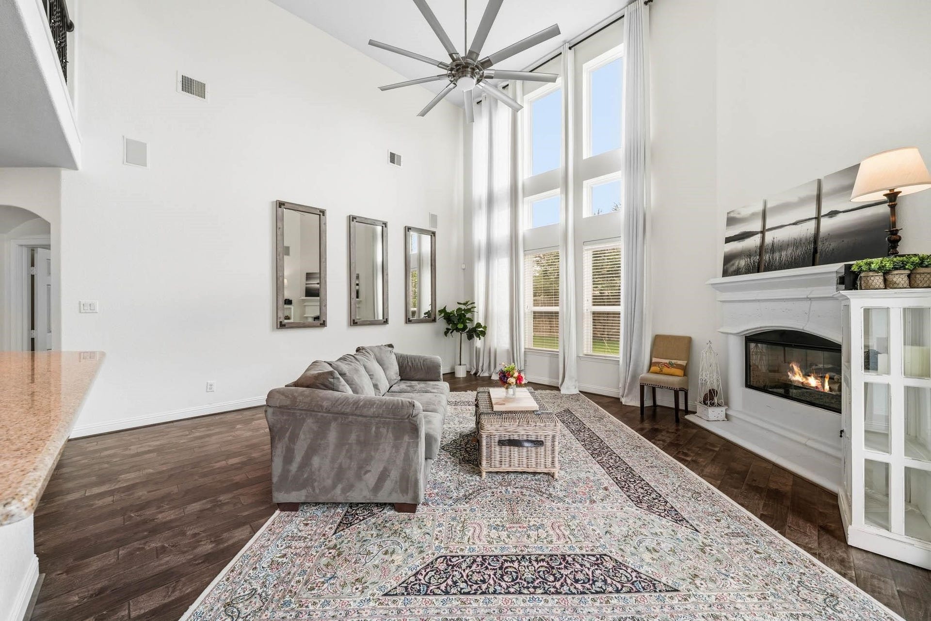 17610 Strackfield Lane, Tomball, TX 77377 Designed for memorable gatherings, the family room features a beautiful cast stone fireplace and a beautiful 8-blade ceiling fan with integrated light.