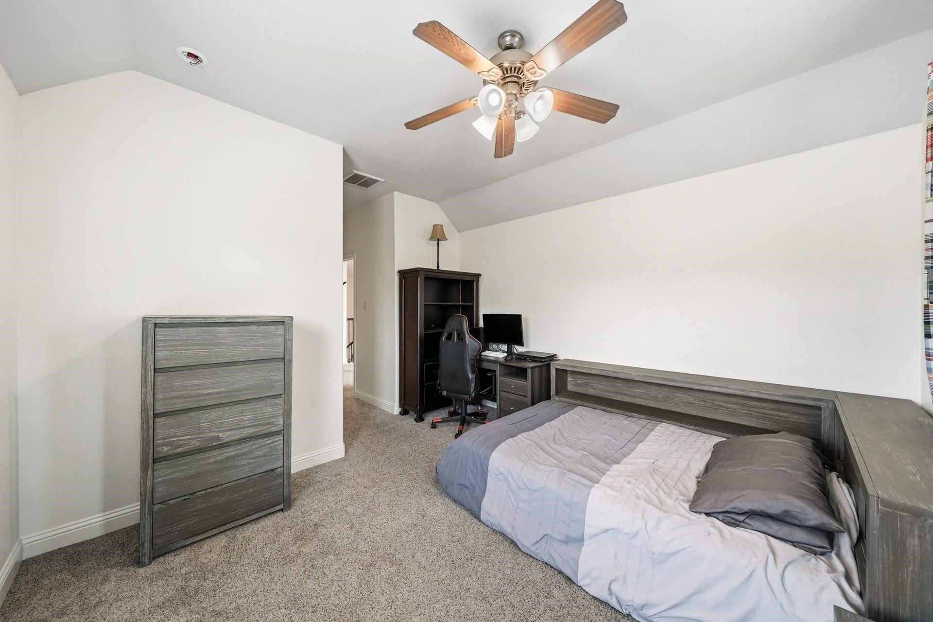 17610 Strackfield Lane, Tomball, TX 77377 Designed for both comfort and function, this space features natural light and a generous walk-in closet that easily accommodates an extensive wardrobe.