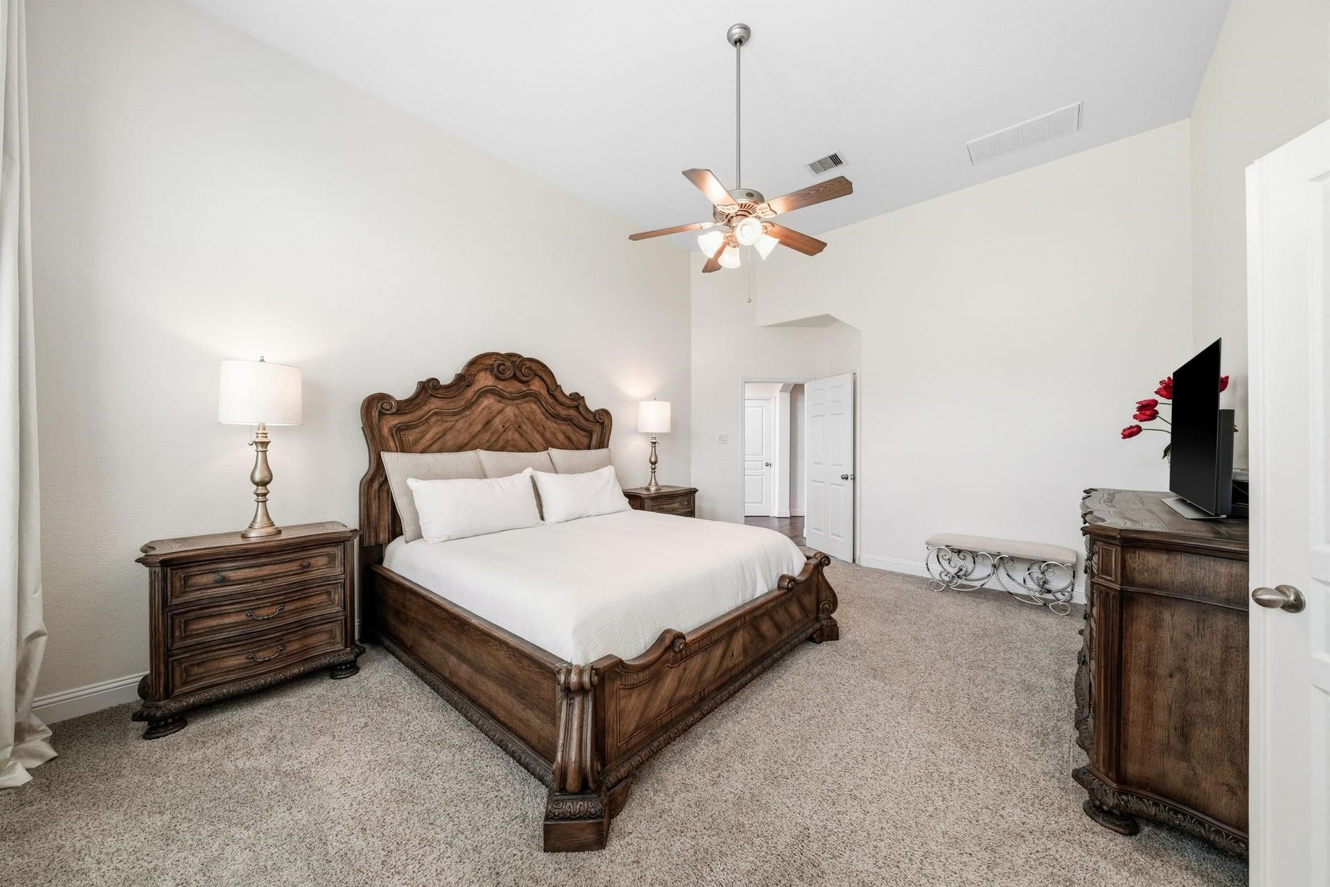 17610 Strackfield Lane, Tomball, TX 77377 Designed as a private sanctuary, the primary suite showcases tall ceilings and an airy ambiance, creating the perfect place to unwind at the end of the day.