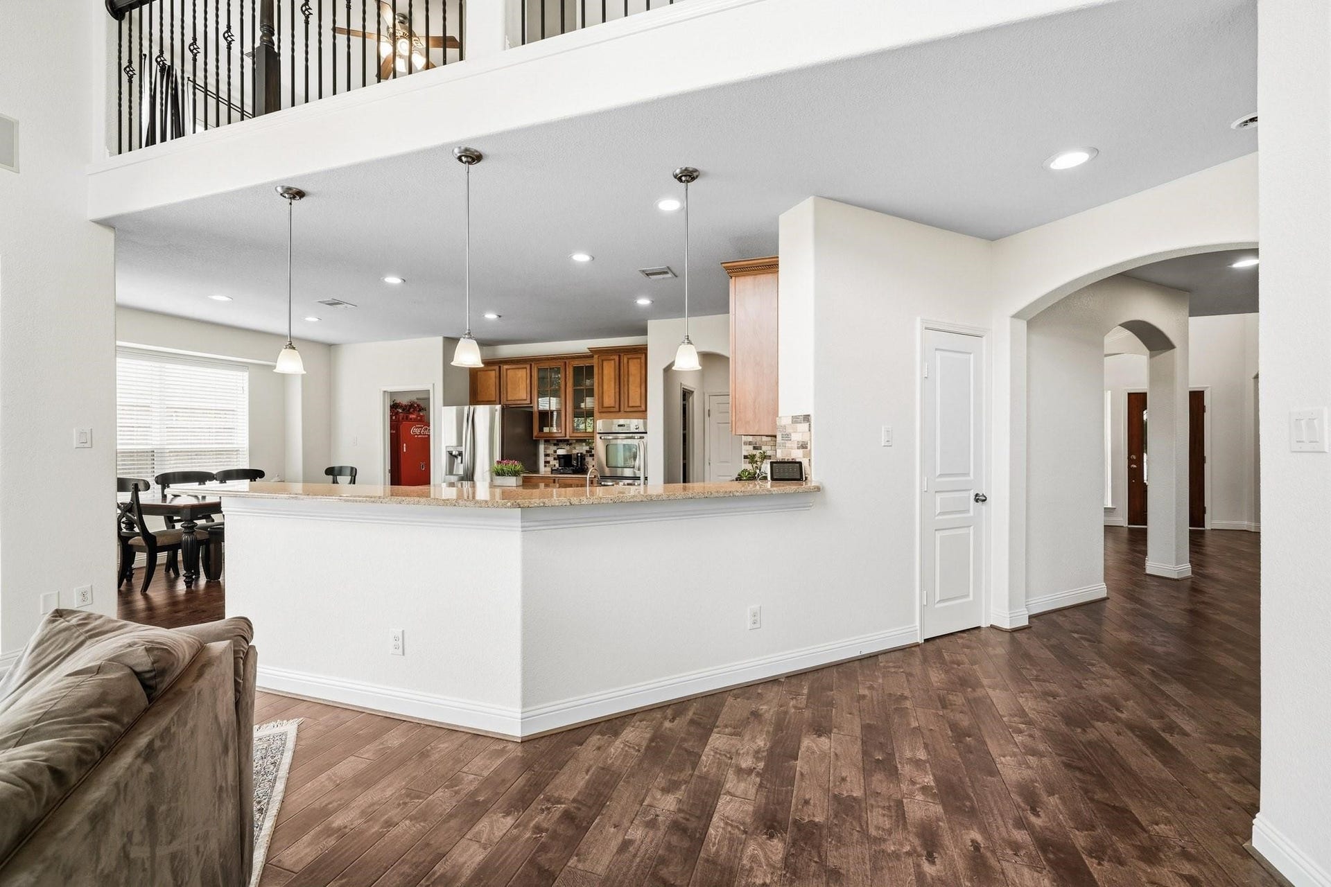 17610 Strackfield Lane, Tomball, TX 77377 The breakfast bar with pendant lighting offers an inviting space for morning coffee, casual dining, and effortless conversation. Added in 2025 to the home was a new roof, electrical panel with generator hookup, HVAC system and whole home surge Protector. Another new HVAC was added in 2024 along with two new water heaters.
