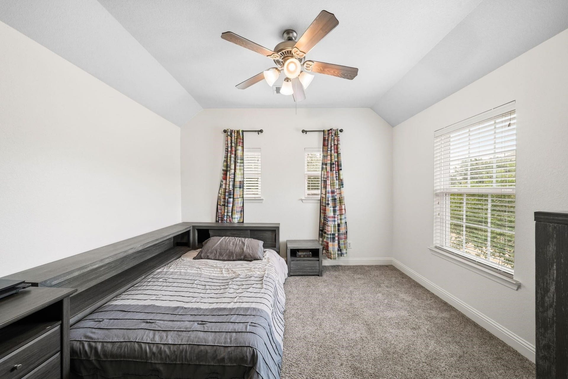 17610 Strackfield Lane, Tomball, TX 77377 Warm, comfortable, and beautifully appointed, the fifth bedroom features plush carpet and an elegant tray ceiling, making it ideal for family or guests.
