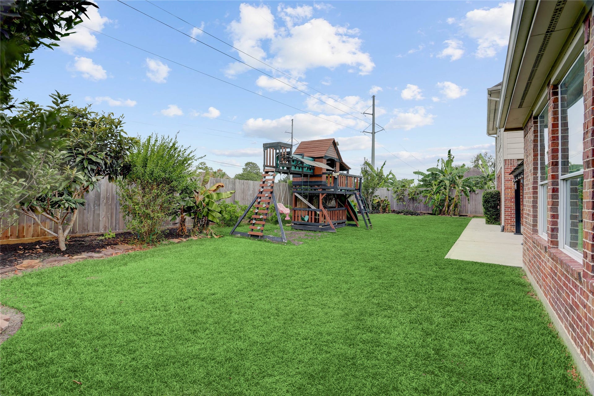 1728 Pampas Trail Drive, Friendswood, TX 77546 Fully Fenced Yard With Playground Set