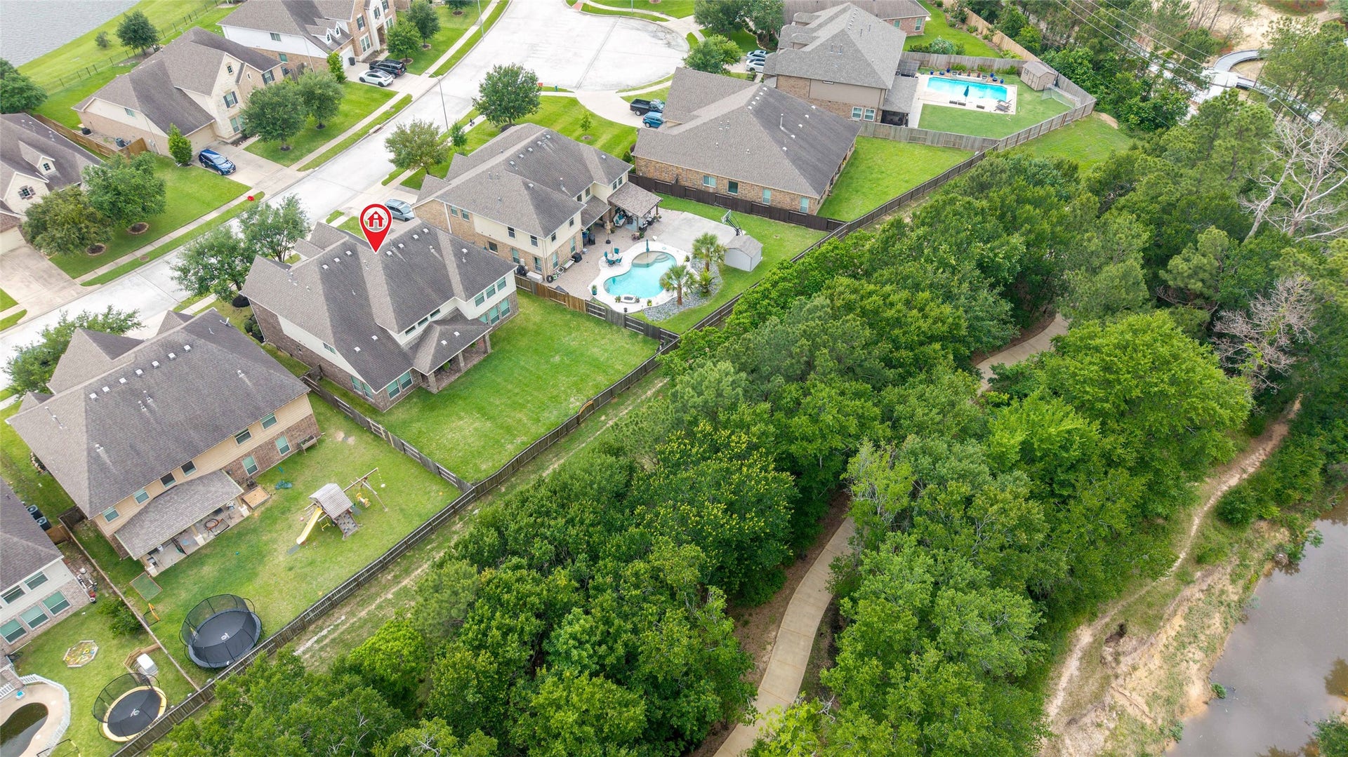 14422 Lakepointe Bend Lane, Cypress, TX 77429 Large tree buffer with walking path...there are 10 neighborhoods interconnected with paths for walking, jogging and biking.