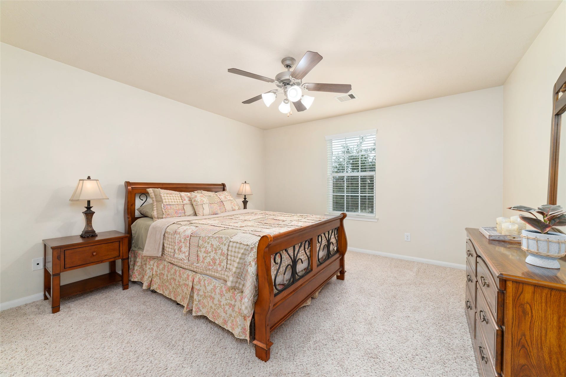14422 Lakepointe Bend Lane, Cypress, TX 77429 Second upstairs bedroom overlooks the front lawn and is full of natural light; Nice walk-in closet and its own vanity area.