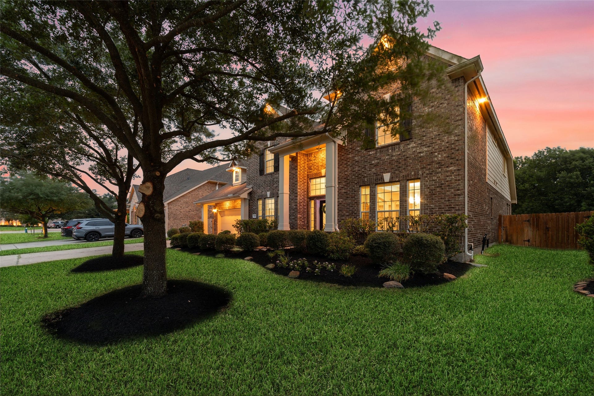 14422 Lakepointe Bend Lane, Cypress, TX 77429 Front of the home at dusk.