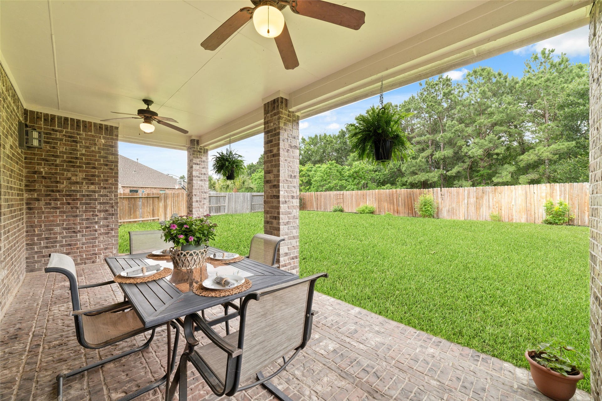 14422 Lakepointe Bend Lane, Cypress, TX 77429 Large covered, brick patio - great for easy entertaining or a peaceful spot for your morning coffee