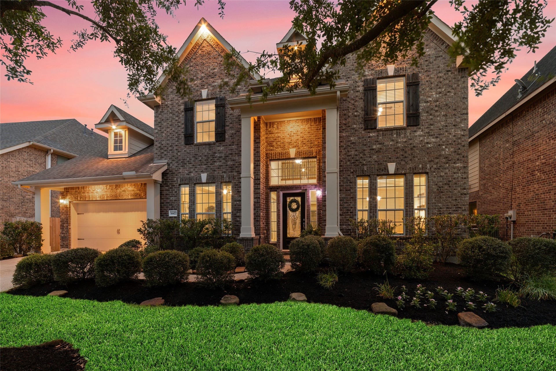 14422 Lakepointe Bend Lane, Cypress, TX 77429 Mature trees, beautiful established landscaping and added outdoor, low voltage, app controlled lighting create a picturesque front view.