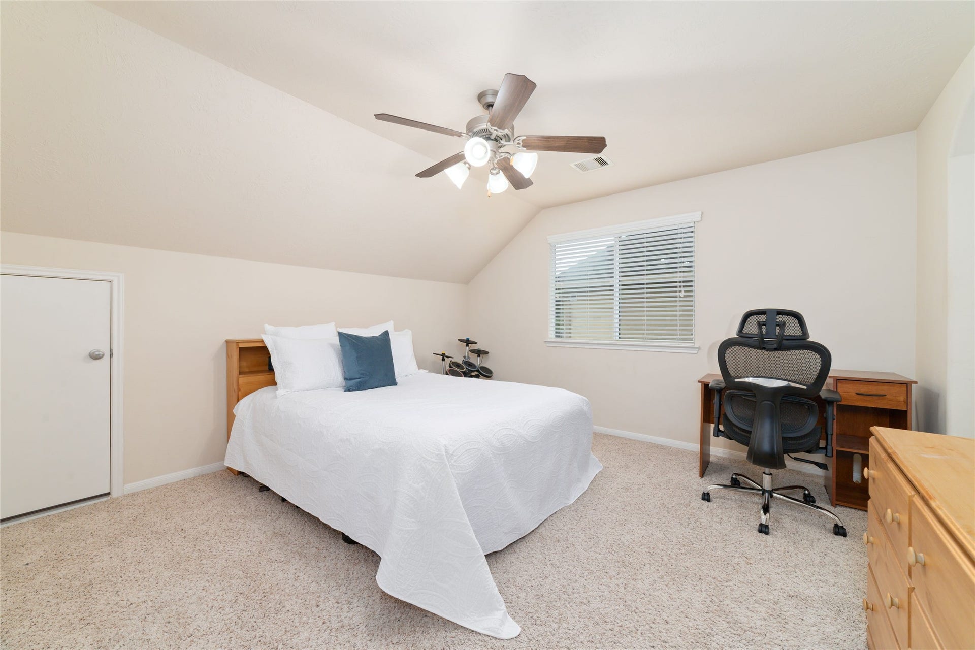 14422 Lakepointe Bend Lane, Cypress, TX 77429 The first of four, spacious upstairs bedrooms share a hollywood style bathroom, each with their own vanity areas and each with their own walk-in closets.