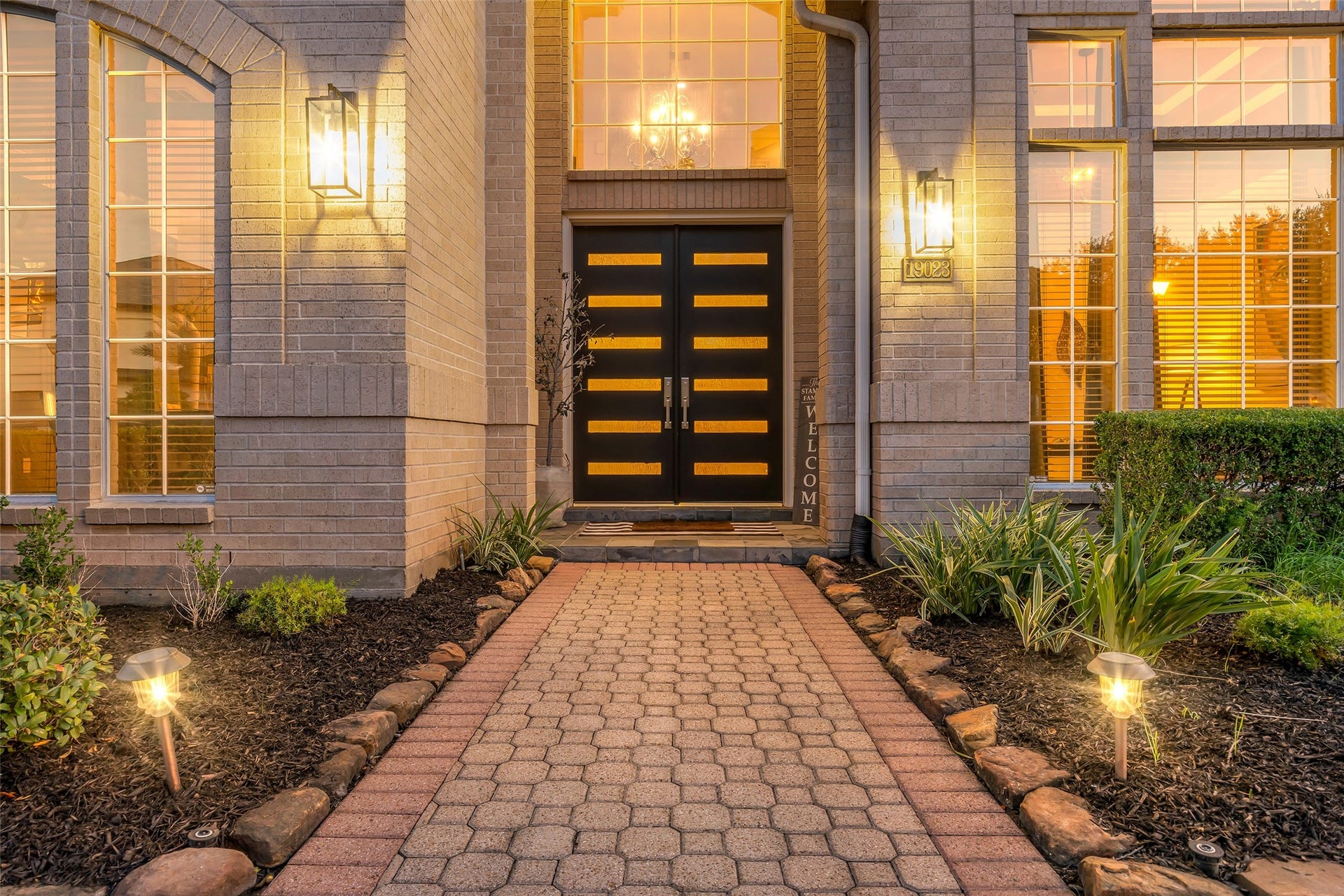 19023 Windsor Lakes Drive, Houston, TX 77094 Inviting entrance with a contemporary front door.