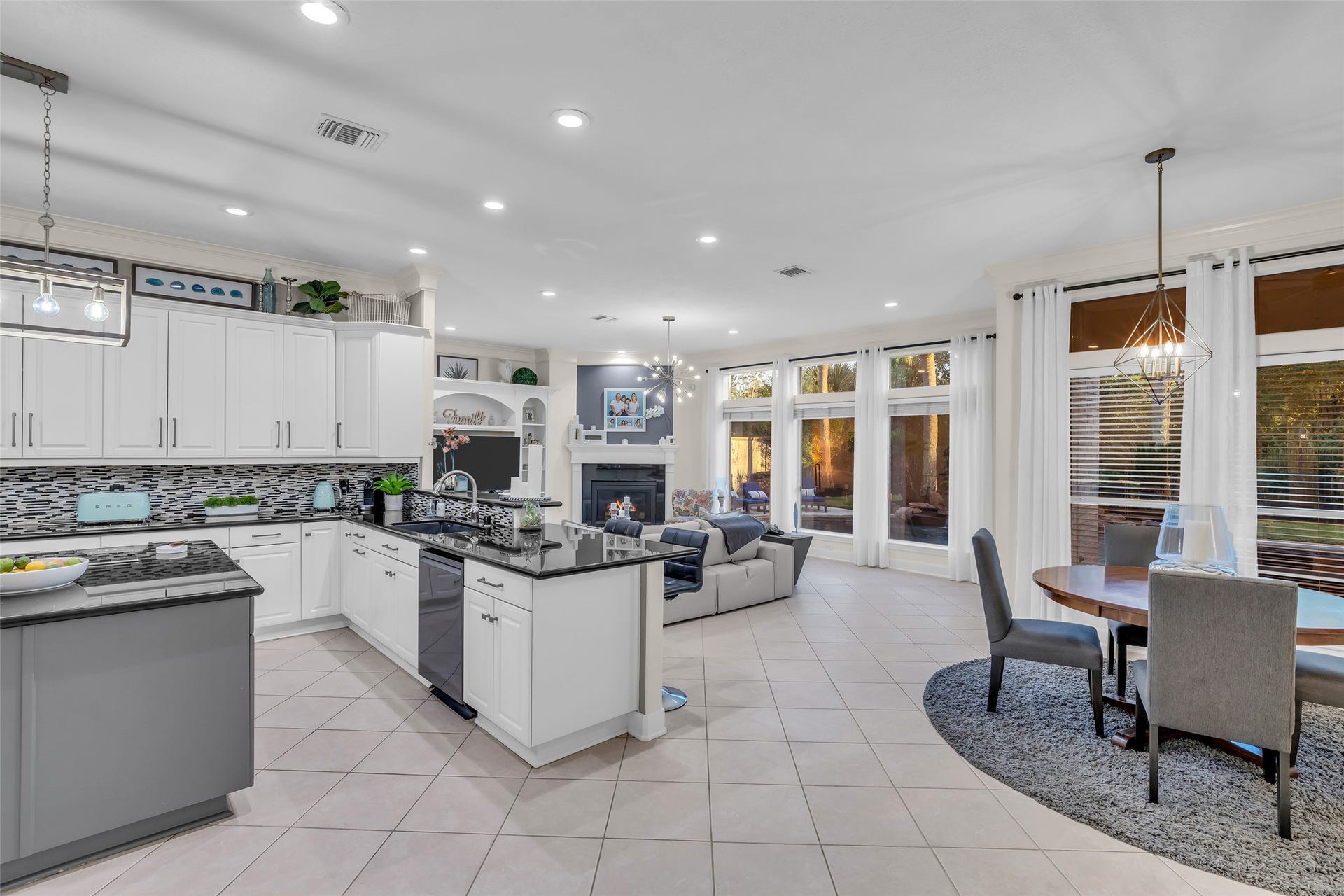 19023 Windsor Lakes Drive, Houston, TX 77094 The living area is open to the breakfast area and kitchen.