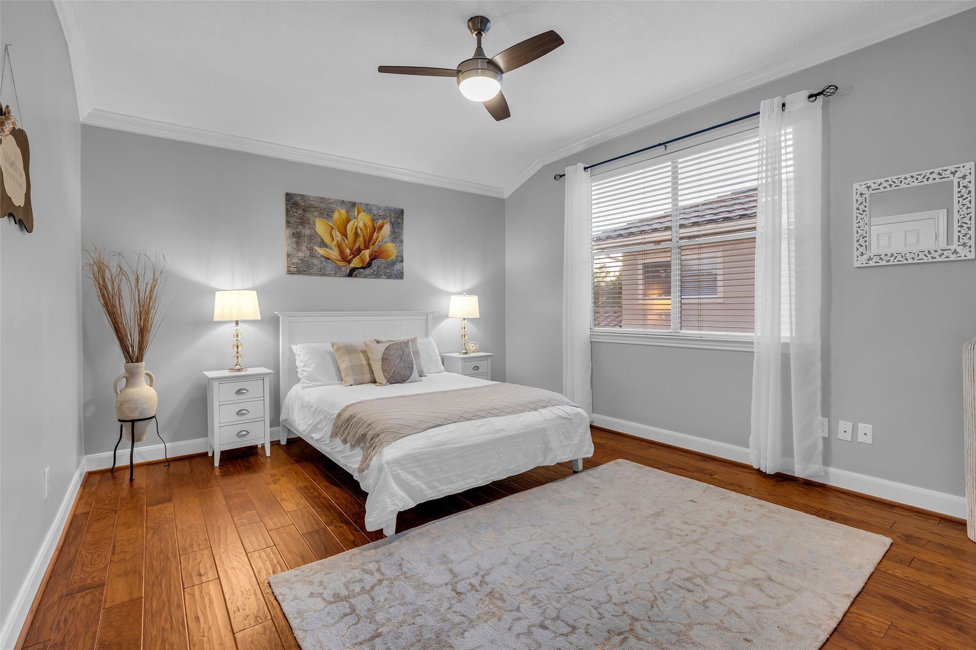 19023 Windsor Lakes Drive, Houston, TX 77094 One of three secondary bedrooms located on the second floor. This one has its own en suite bathroom.