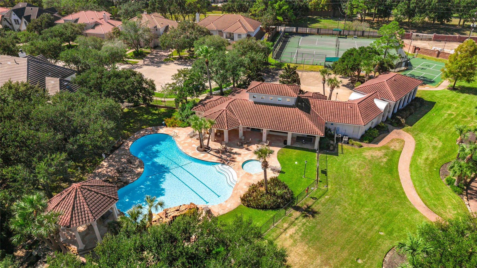 19023 Windsor Lakes Drive, Houston, TX 77094 Community amenities include a swimming pool, and tennis courts.