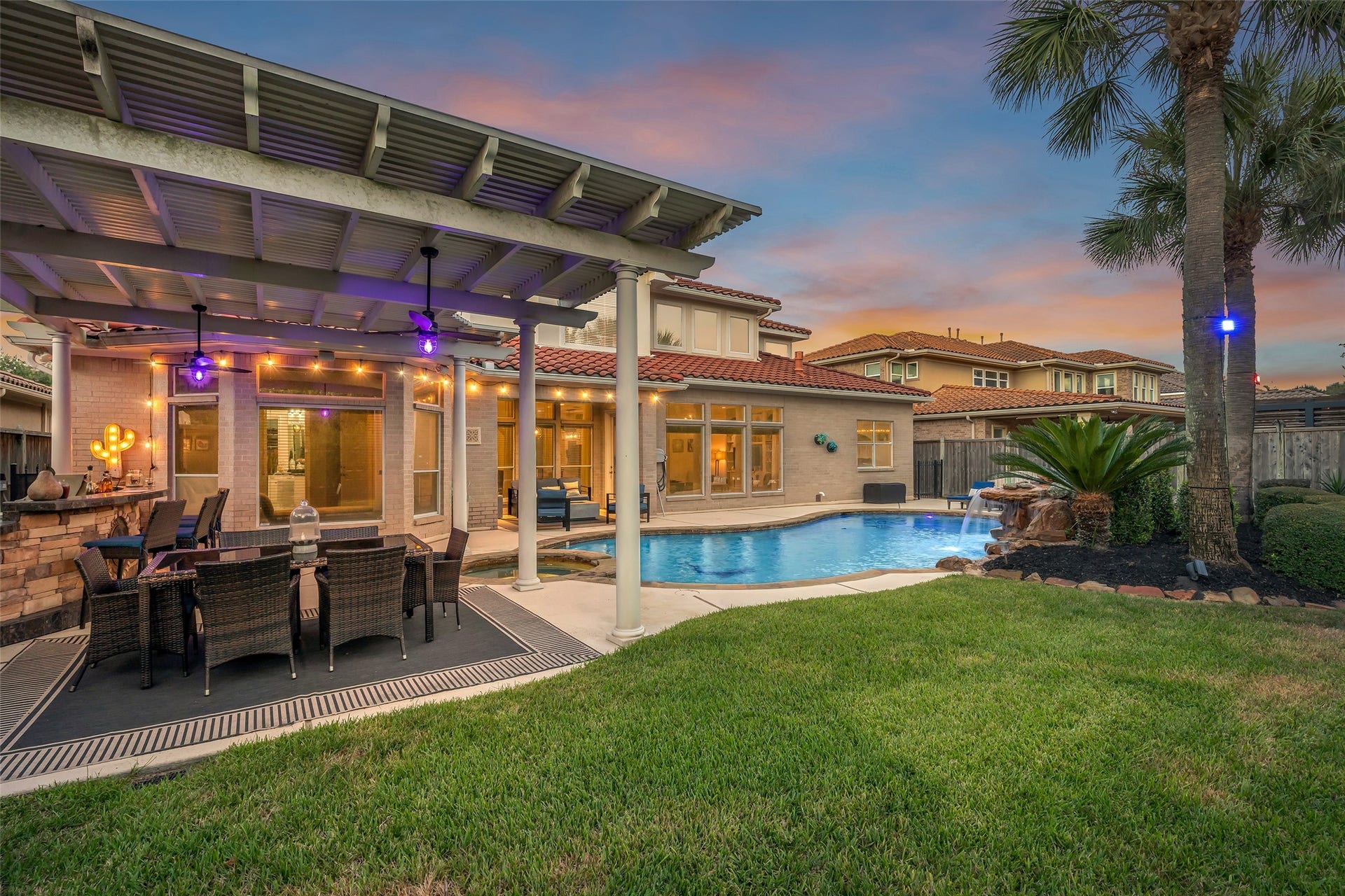 19023 Windsor Lakes Drive, Houston, TX 77094 The pergola offers the perfect dining space. Close to the bar and outdoor kitchen area.
