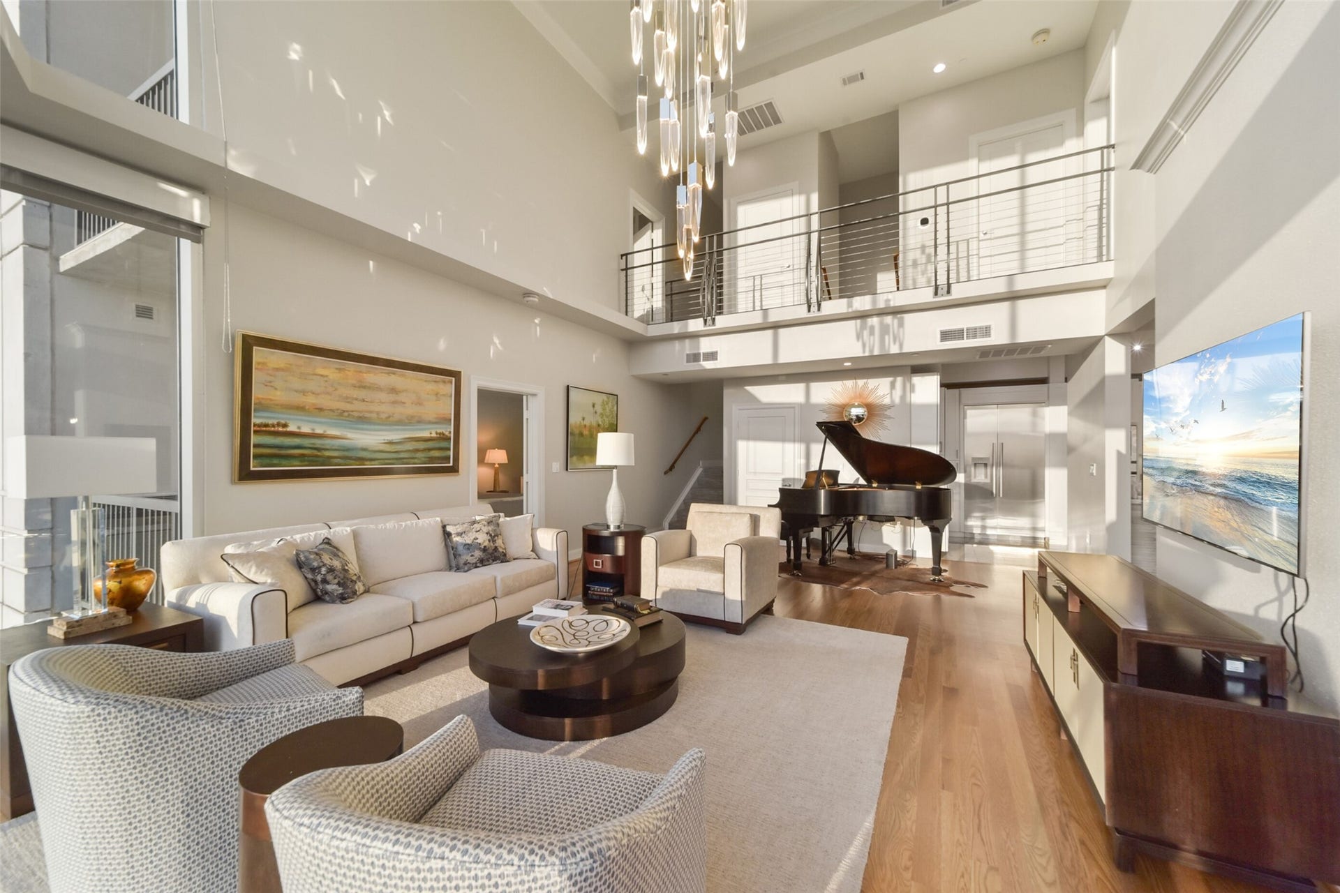 3333 Allen Parkway, #3003, Houston, TX 77019 This perspective of the living room demonstrates the size and gives a view of the designer railing upstairs.